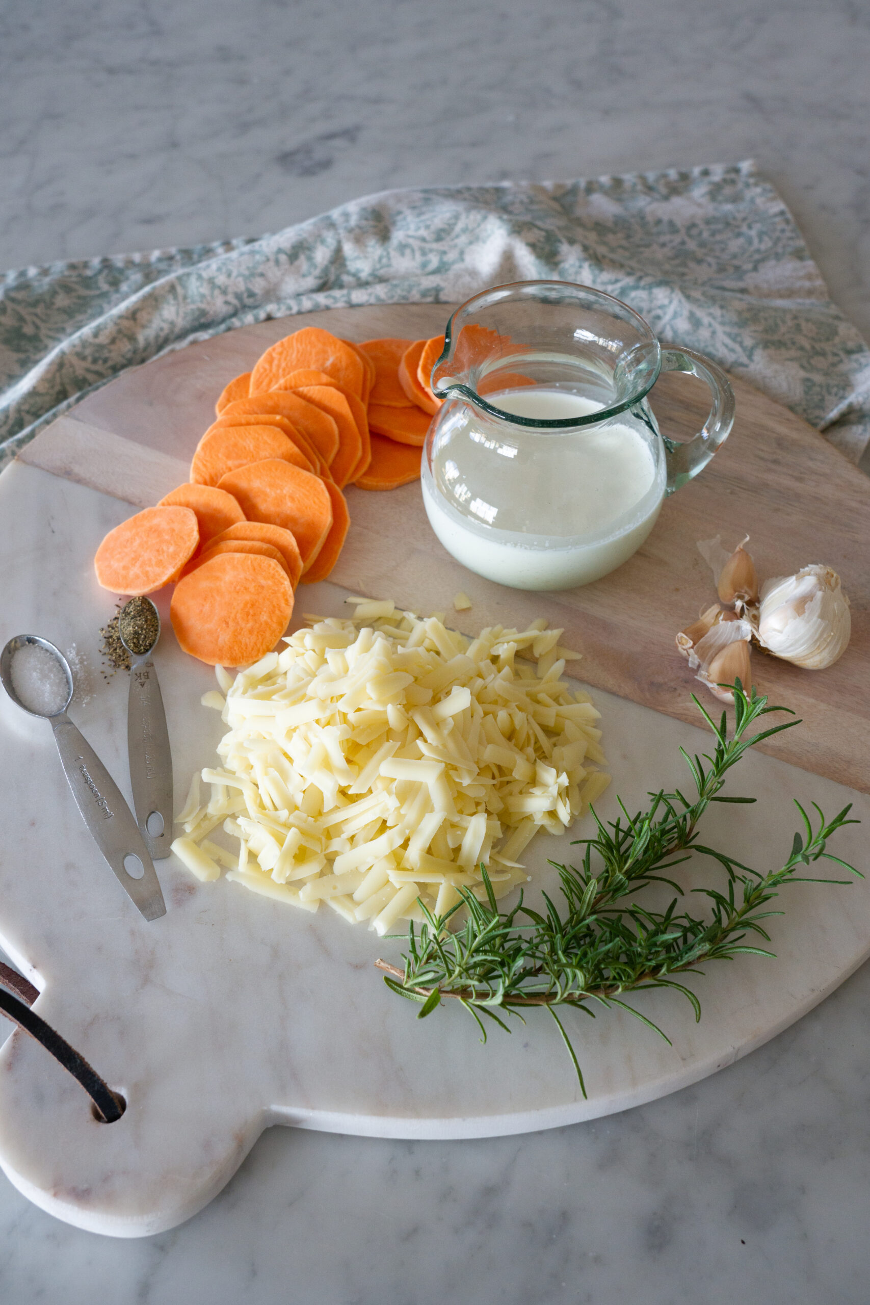 Scalloped Sweet Potato Stacks ingredients on a round platter.