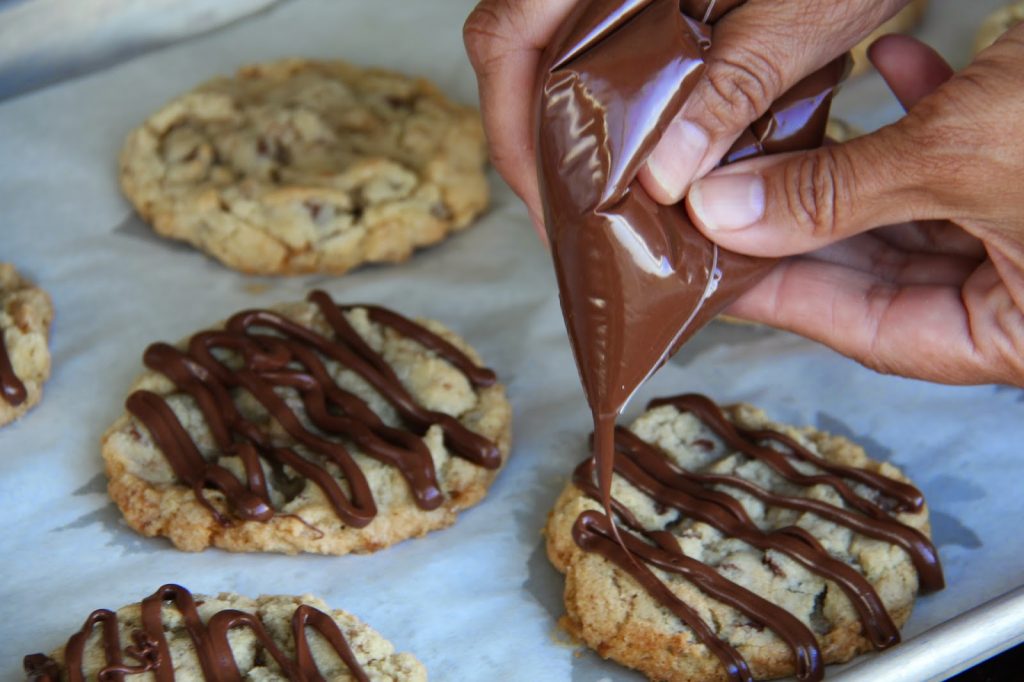 Toffee and Chocolate Chip Cookies with Salted Chocolate Drizzle