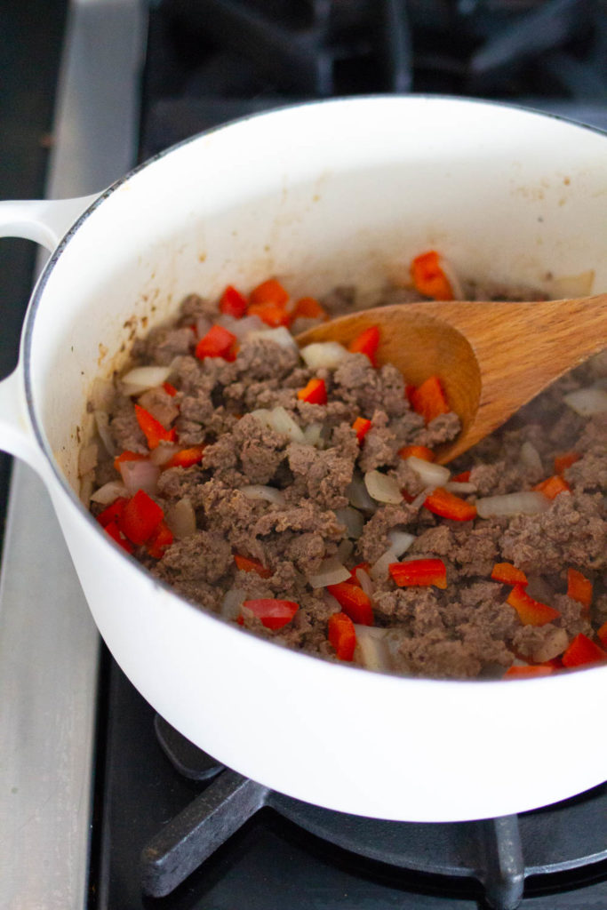 sandwich made with ground beef, onions and red peppers