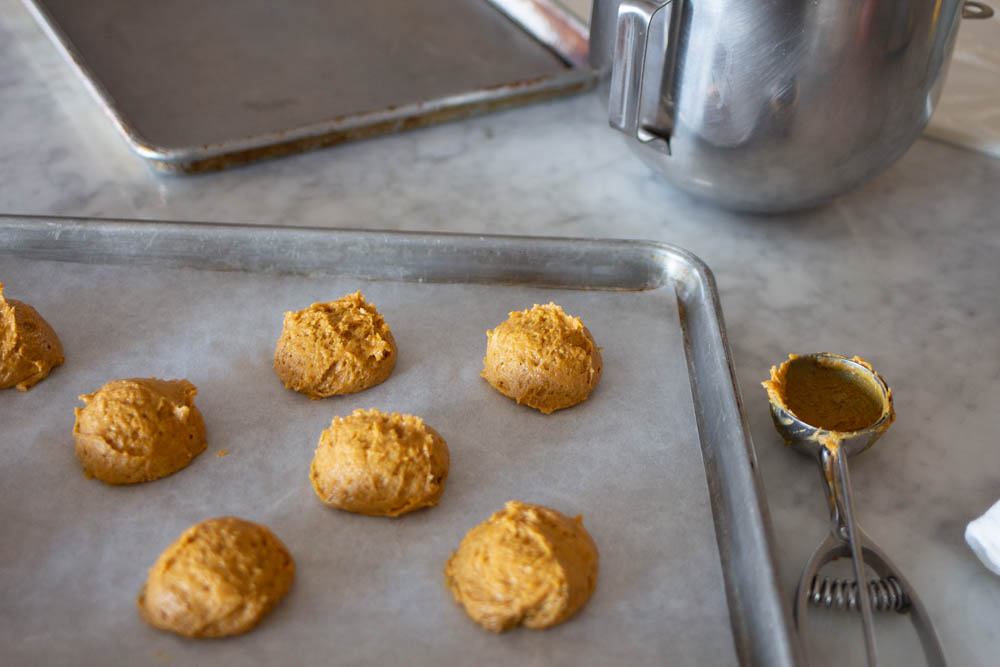 scooping pumpkin cookie dough