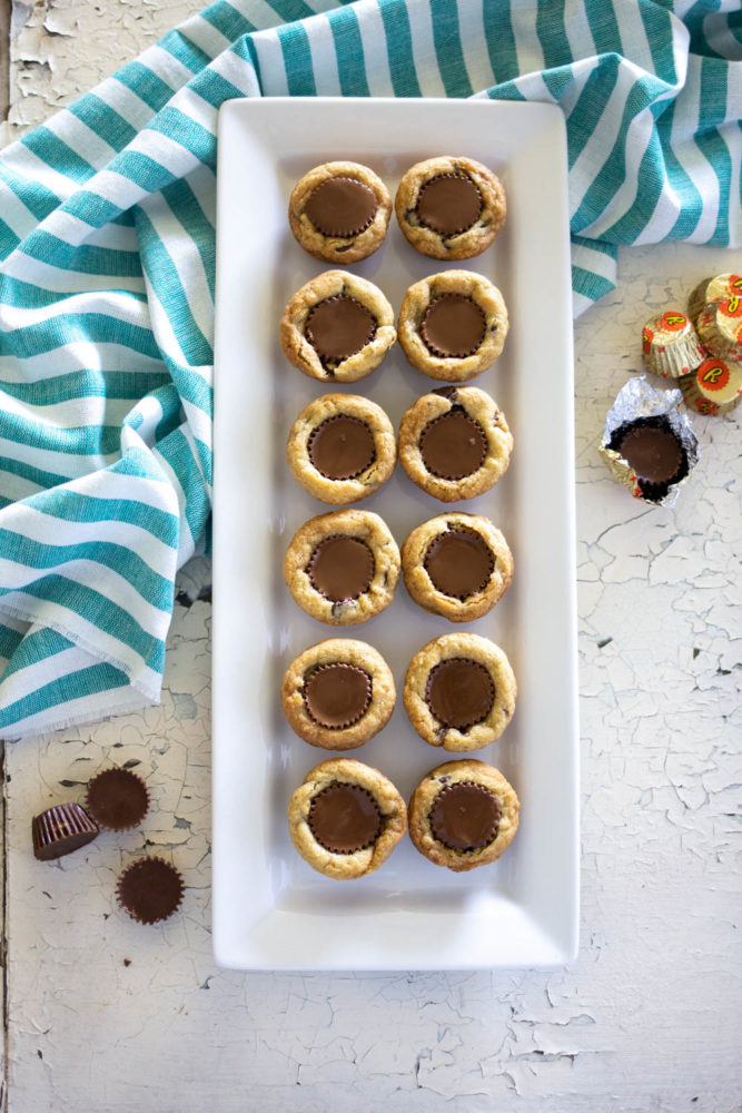 peanut butter and chocolate cookies made with Reeses peanut butter cups