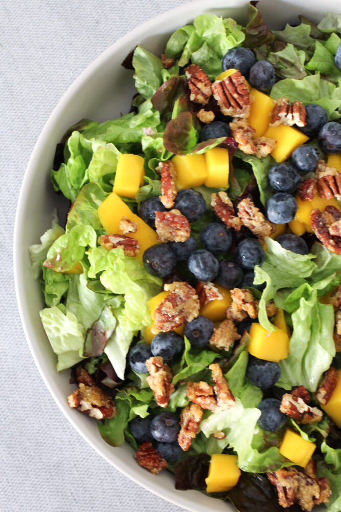 Fresh blueberries and green salad