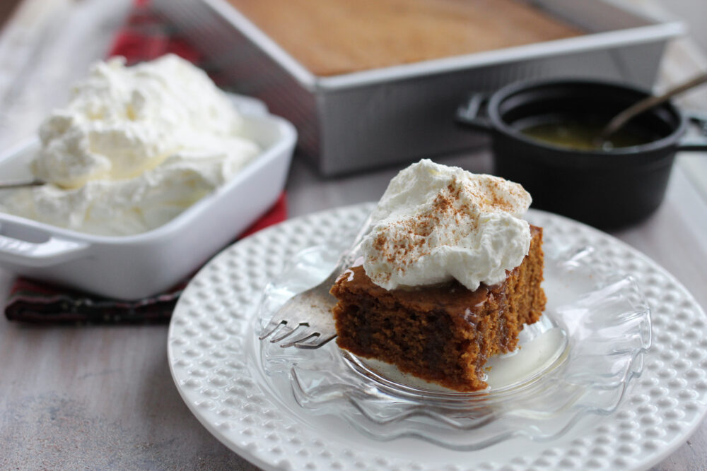 Homemade Ginger Cake with cream and warm  lemon sauce