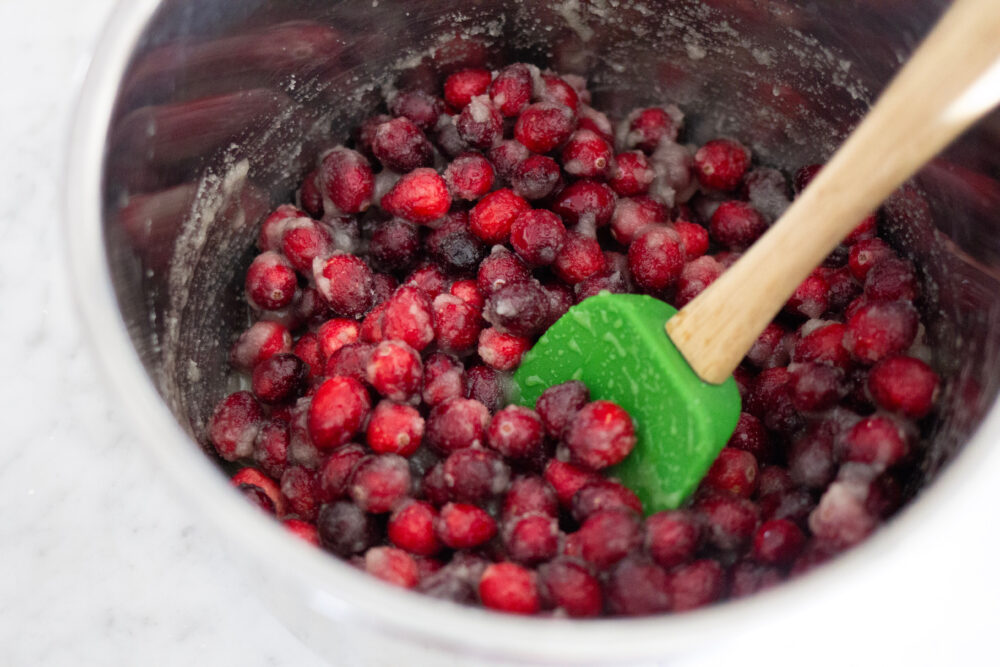 Stirring the cranberries and sugar
