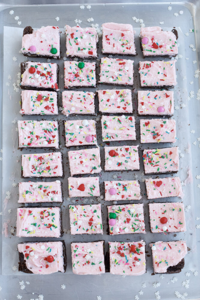 Pink Peppermint Christmas Brownies with White Chocolate Frosting