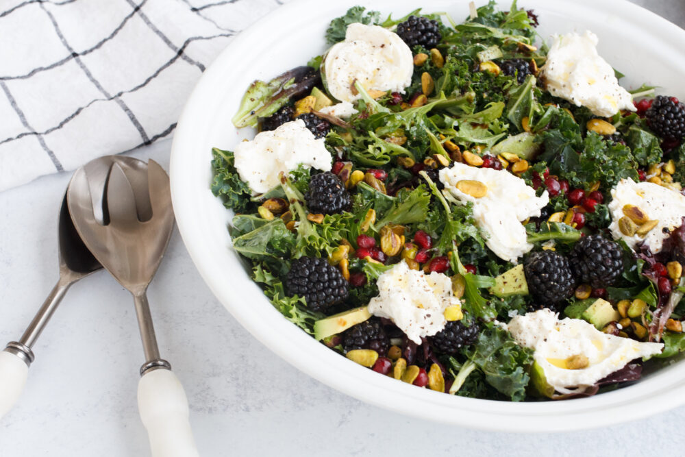 blackberries, pomegranates and burrata in kale salad