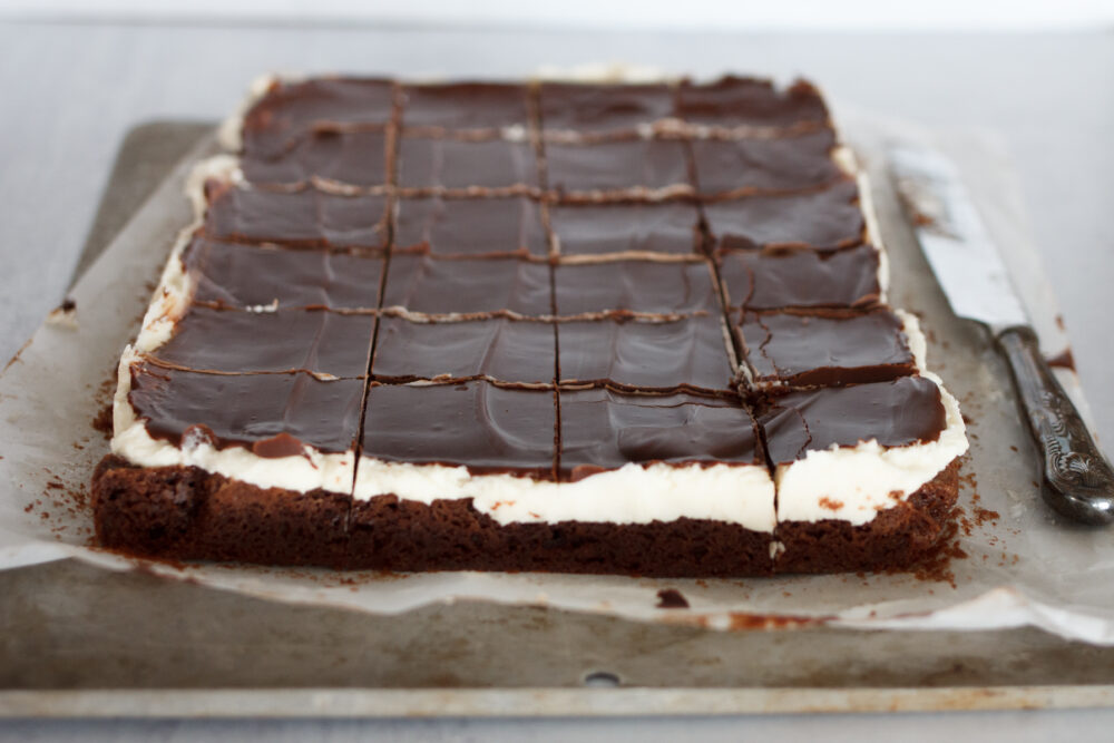 Brownies with buttercream and chocolate glaze