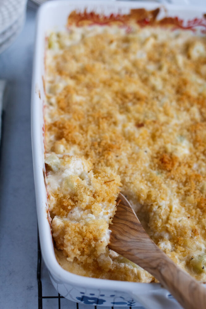 panko crumbs on top of baked cheesy cauliflower 