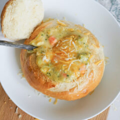 Easy Bread Bowls for Soup with broccoli soup and a spoon