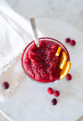 3 Ingredient No-Cook Cranberry Orange Relish in a glass bowl with spoon.